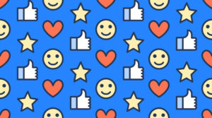 Colorful pattern featuring smiley faces, thumbs up, hearts, and stars on a blue background, representing positive emotions and engagement, relevant for Michigan web design aesthetics.