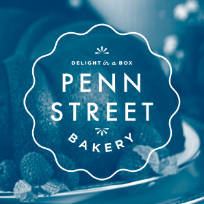 Logo of Penn Street Bakery featuring a decorative design with the phrase "Delight in a Bite," showcasing a focus on baked goods. This image represents a local business in Michigan, emphasizing the importance of web design for attracting customers online.