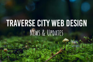 Image featuring a lush green background with mushrooms, highlighting Traverse City web design news and updates, relevant for Michigan web design enthusiasts.