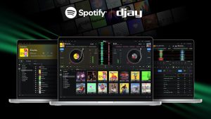 Screen displaying the djay software with Spotify integration, showcasing a music mixing interface and album artwork, ideal for Michigan web design projects focusing on music and entertainment.